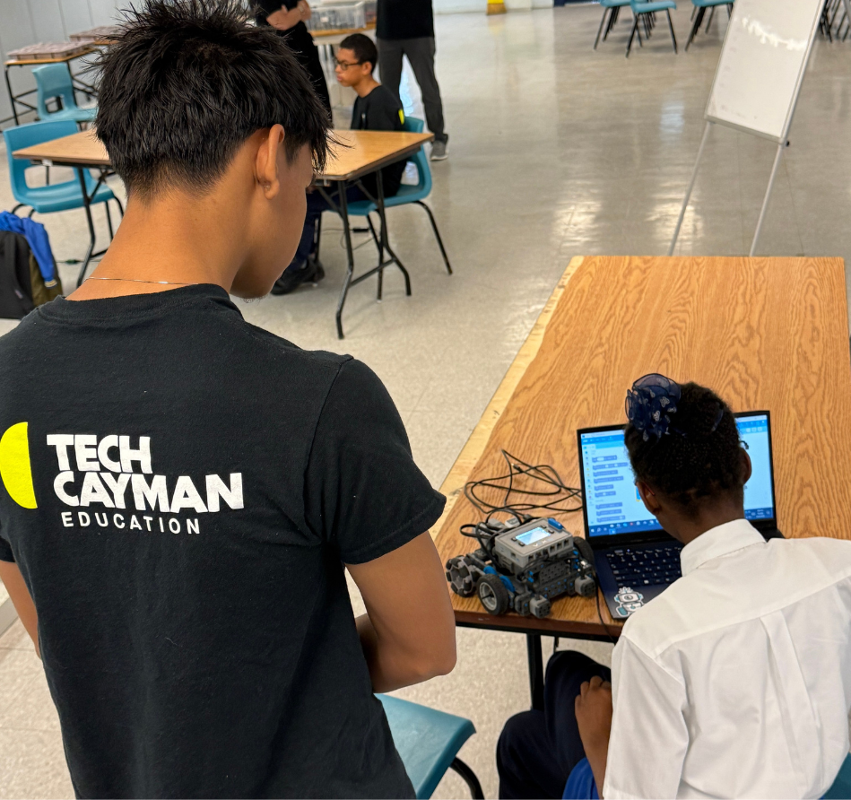 TJ Hansraj Tech mentor at Cayman Islands STEM education event.